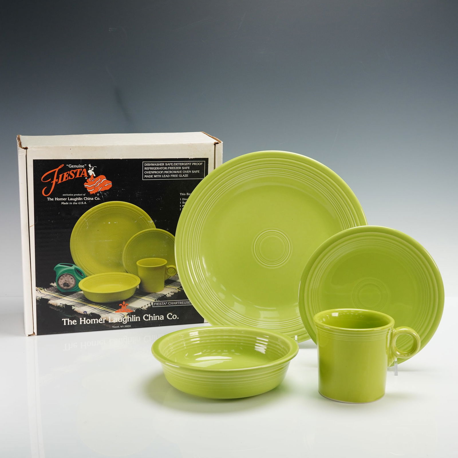 Fiesta Chartreuse Dinnerware Set, 4 Piece Place Setting: Genuine Fiesta dinnerware set by The Homer Laughlin China Co., in the vibrant Chartreuse glaze. This four-piece place setting includes a dinner plate, salad plate, soup bowl, and mug, each displaying