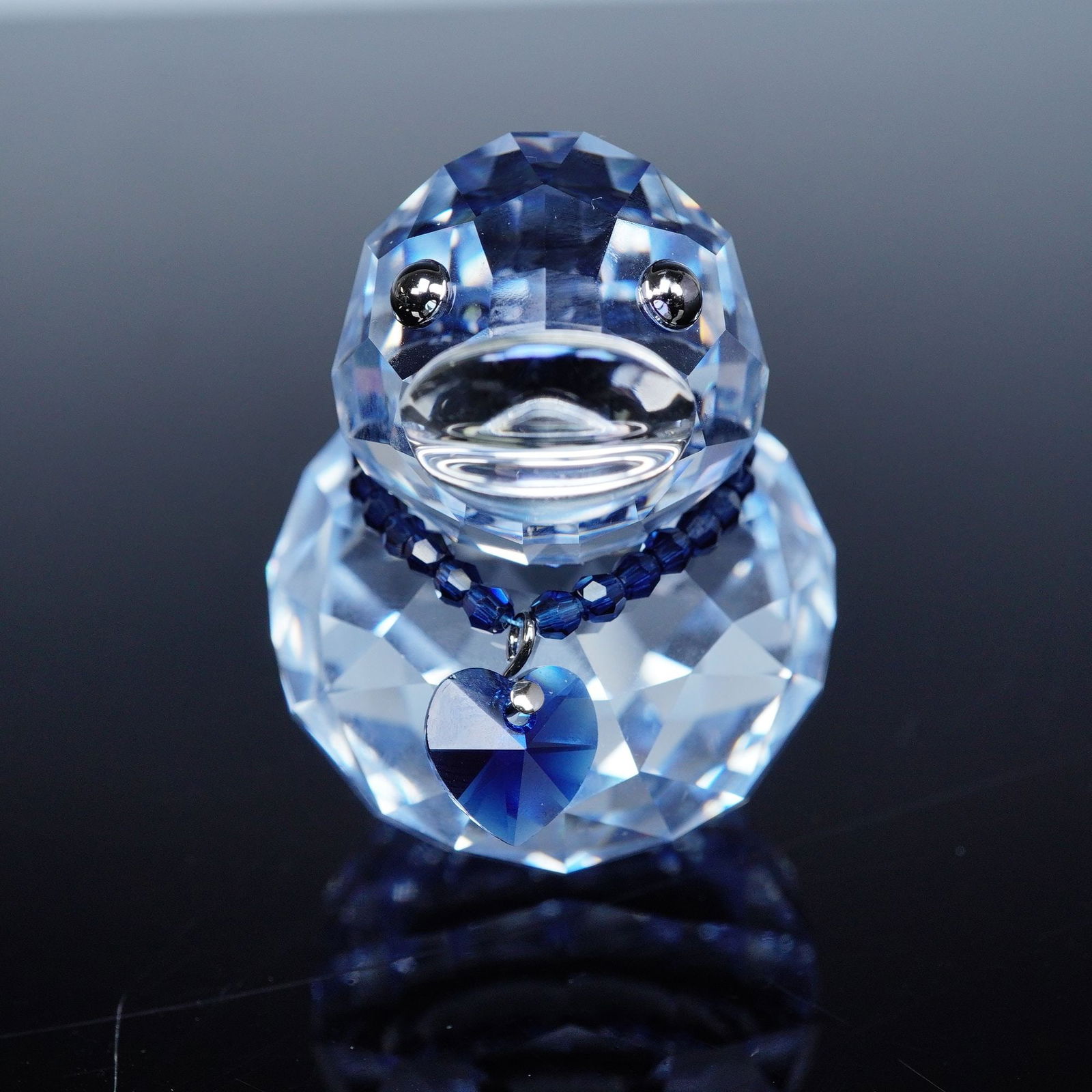 Swarovski Crystal Figurine, Happy Duck Jolly Jay: This Swarovski crystal Happy Duck is called Jolly Jay. This charming medium-sized duck is part of a range of happy and cheerful messengers of positive emotions. Its fully faceted Lavender crystal body