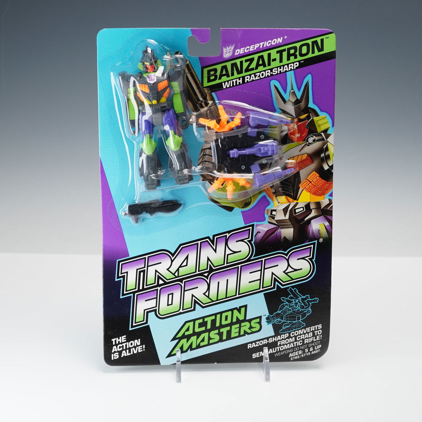 Transformers Action Masters Figurine Decepticon Banzai-Tron w/ Razor-Sharp: Transformers Action Masters Decepticon Banzai-Tron figure with Razor-Sharp partner, sealed on original blister card. Razor-Sharp converts from crab to semi-automatic rifle. Marked 1989 Hasbro, Inc. Ca
