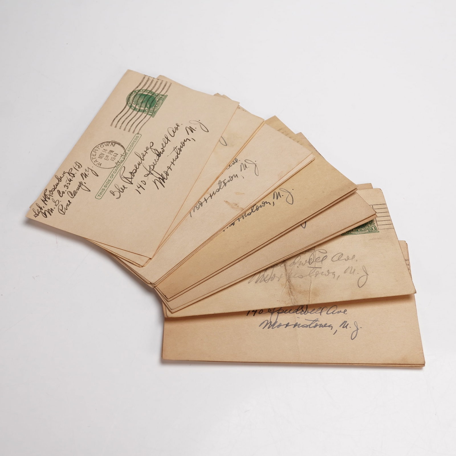 20pc WWII Pine Camp Postal Cards: Group of 20 World War II era US Army postal cards sent in 1941 and 1942 by H. Rosenberg from Pine Camp, New York, to family in Morristown, New Jersey. Each card carries handwritten correspondence on o