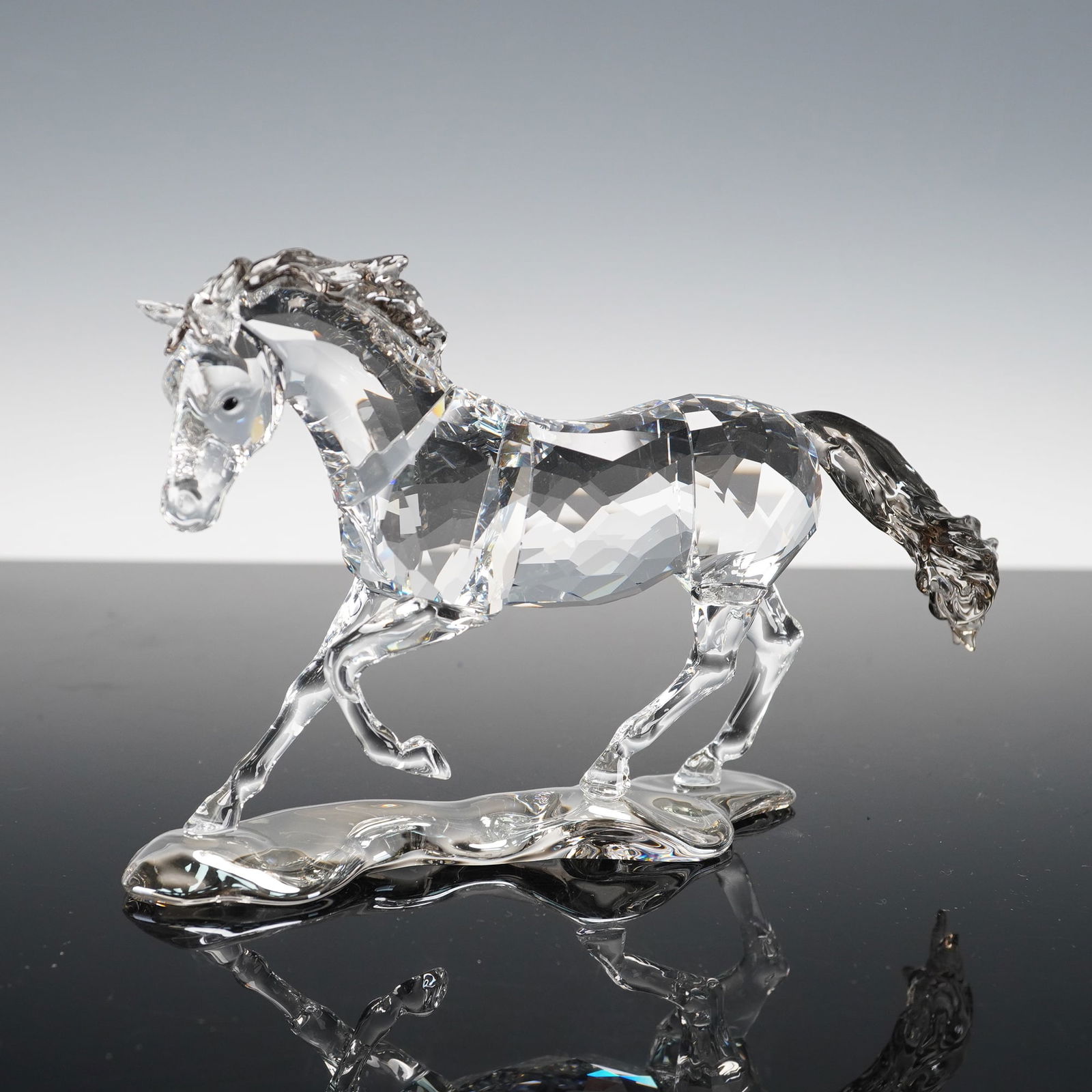 Swarovski Crystal Figurine, Esperanza: Produced as the 2014 SCS Annual Edition, depicting the Esperanza horse inspired by the Criollo breed of South America. Crafted in clear crystal with Crystal Satin mane and tail, set on a Crystal Silve
