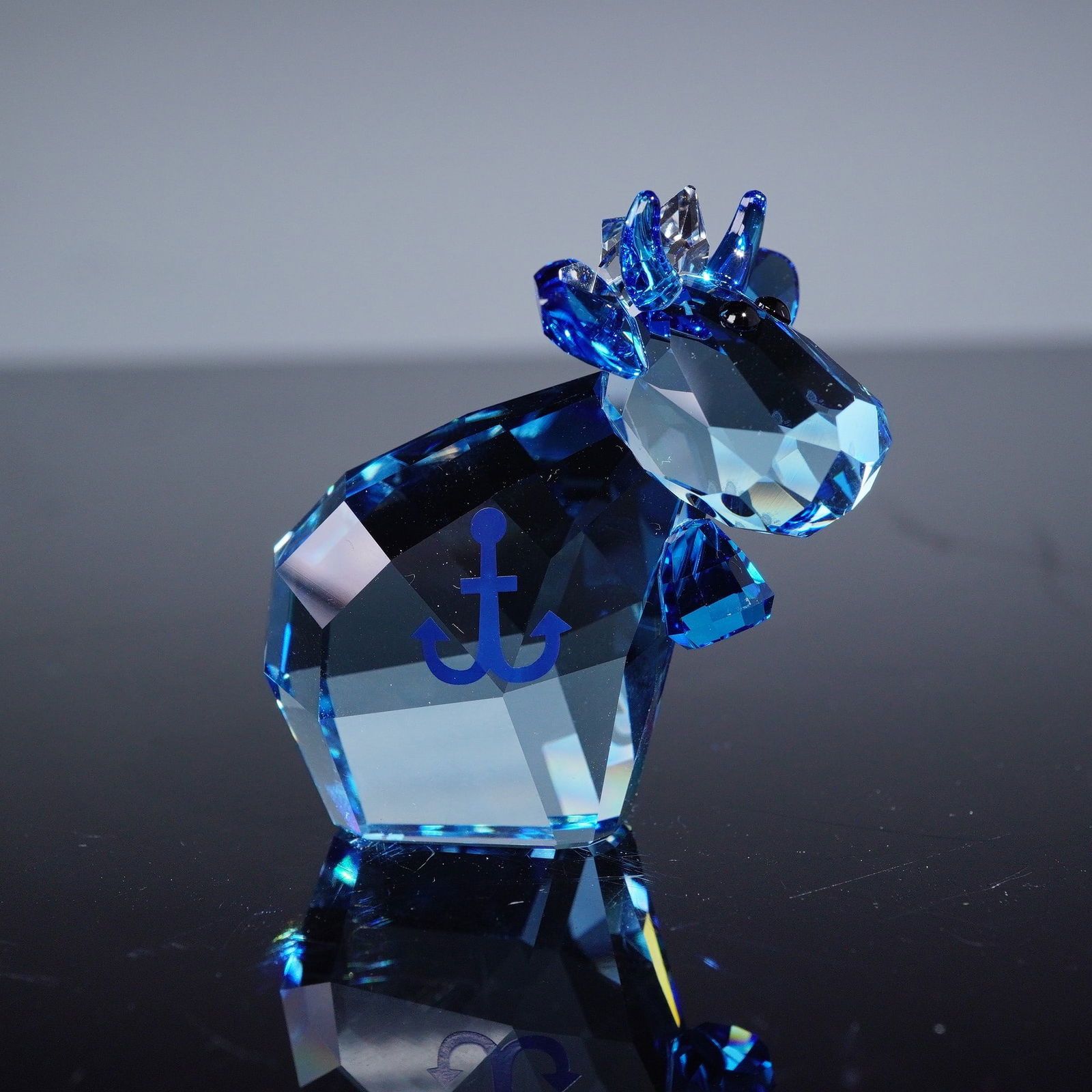 Swarovski Lovlots Sailor Mo Limited Edition 2017 Crystal Figurine: A Swarovski Lovlots 'Sailor Mo' limited edition crystal figurine, dated 2017. Crafted from translucent blue faceted crystal, the character features numerous facets creating a sparkling effect, with a