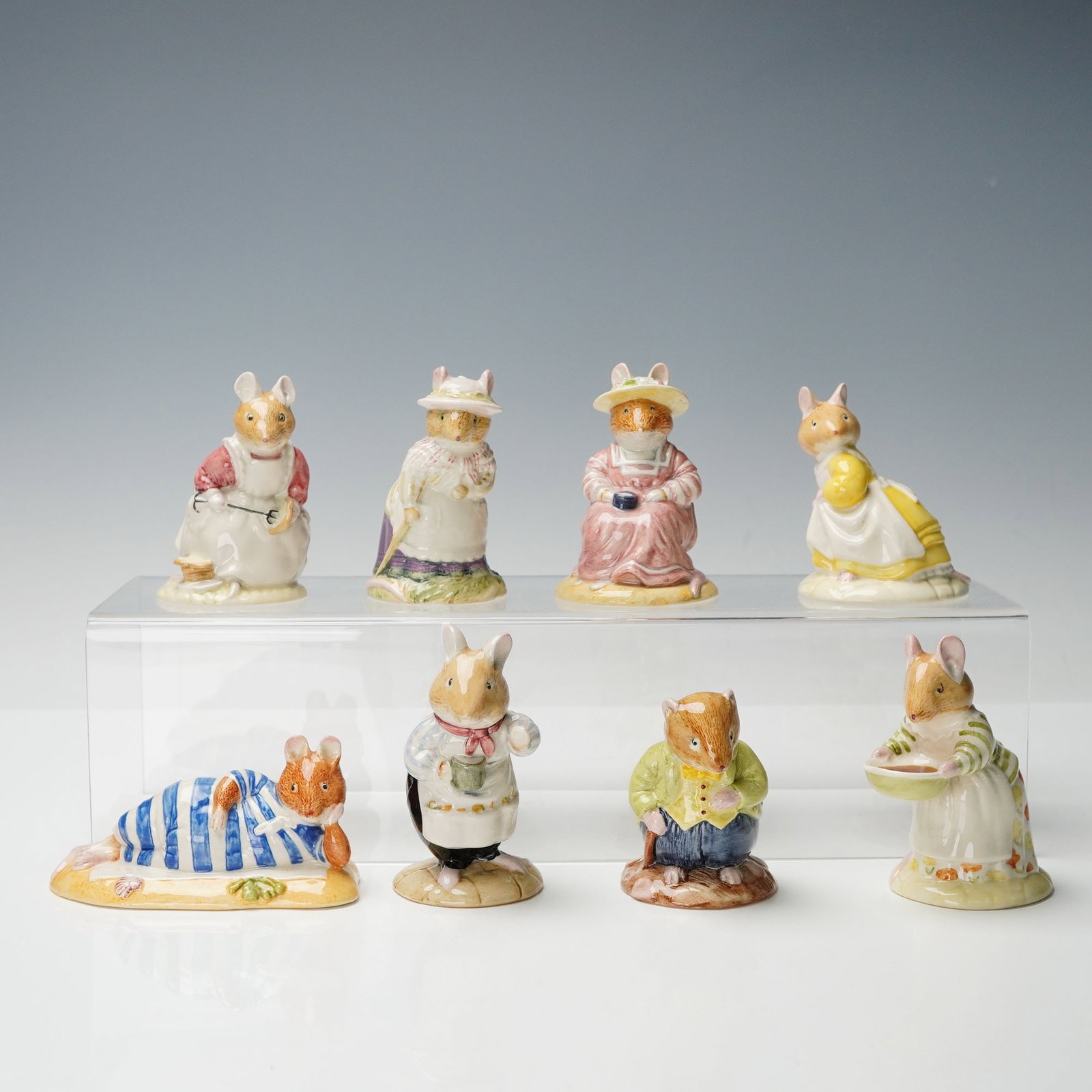 8pc Royal Doulton Brambly Hedge Figurines: A delightful collection of eight Royal Doulton bone china figurines inspired by Jill Barklem's beloved Brambly Hedge stories. Each charmingly hand-painted figure depicts one of the anthropomorphic mic
