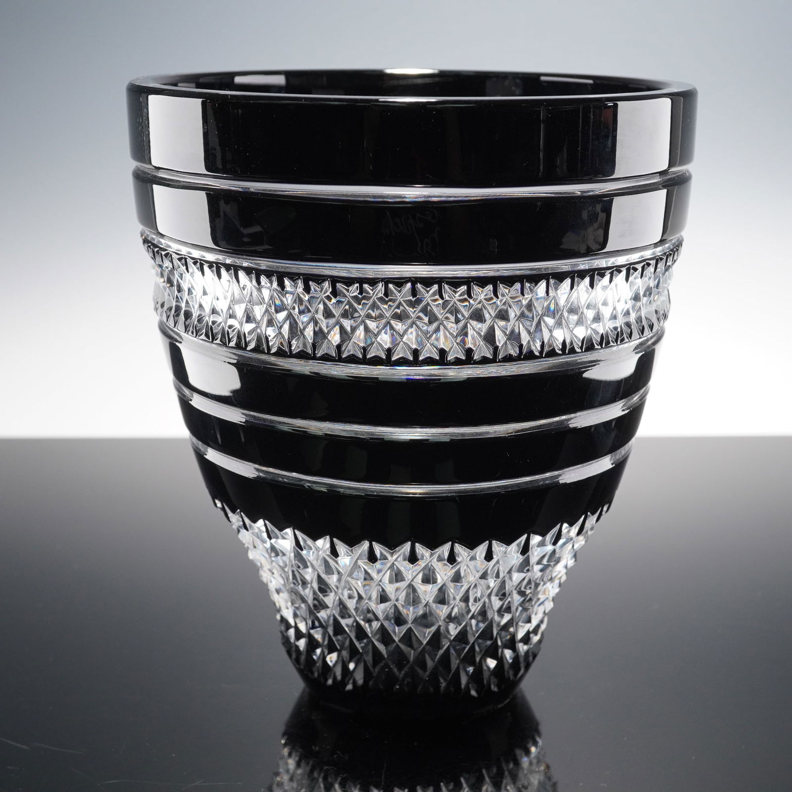 Waterford Crystal by John Rocha Bouquet Vase, Black Cut To Clear: Striking small bouquet vase designed by John Rocha for Waterford Crystal, featuring an elegant modern silhouette in black cut-to-clear lead crystal. The piece displays bold horizontal bands with a dee