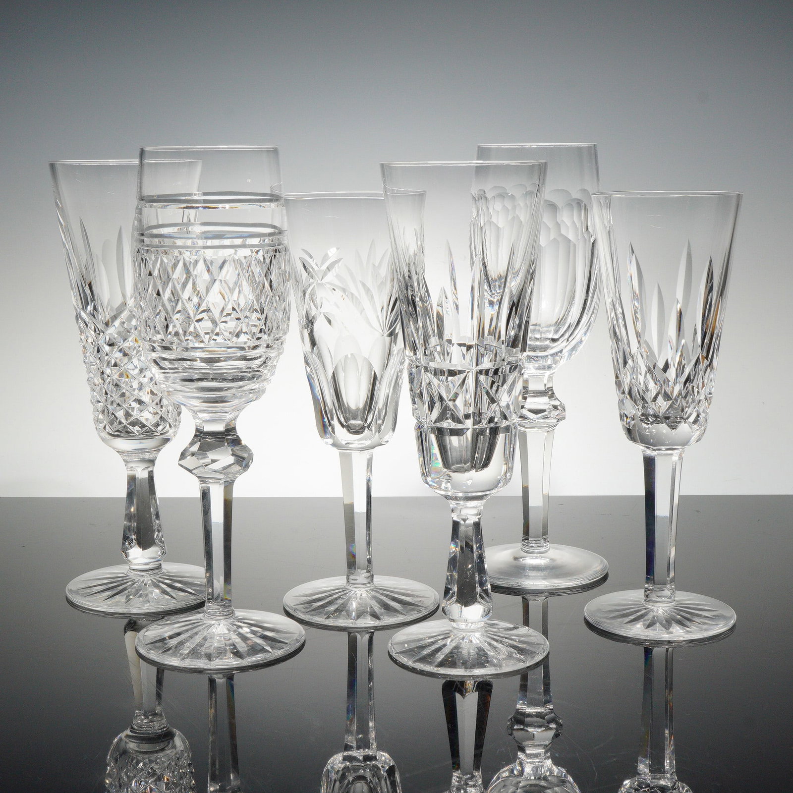 6pc Waterford Crystal Wine & Champagne Glasses: A fine selection of six Waterford crystal stemware pieces showcasing the brand's signature brilliance and craftsmanship. The assortment includes both wine and champagne glasses, each distinguished by 