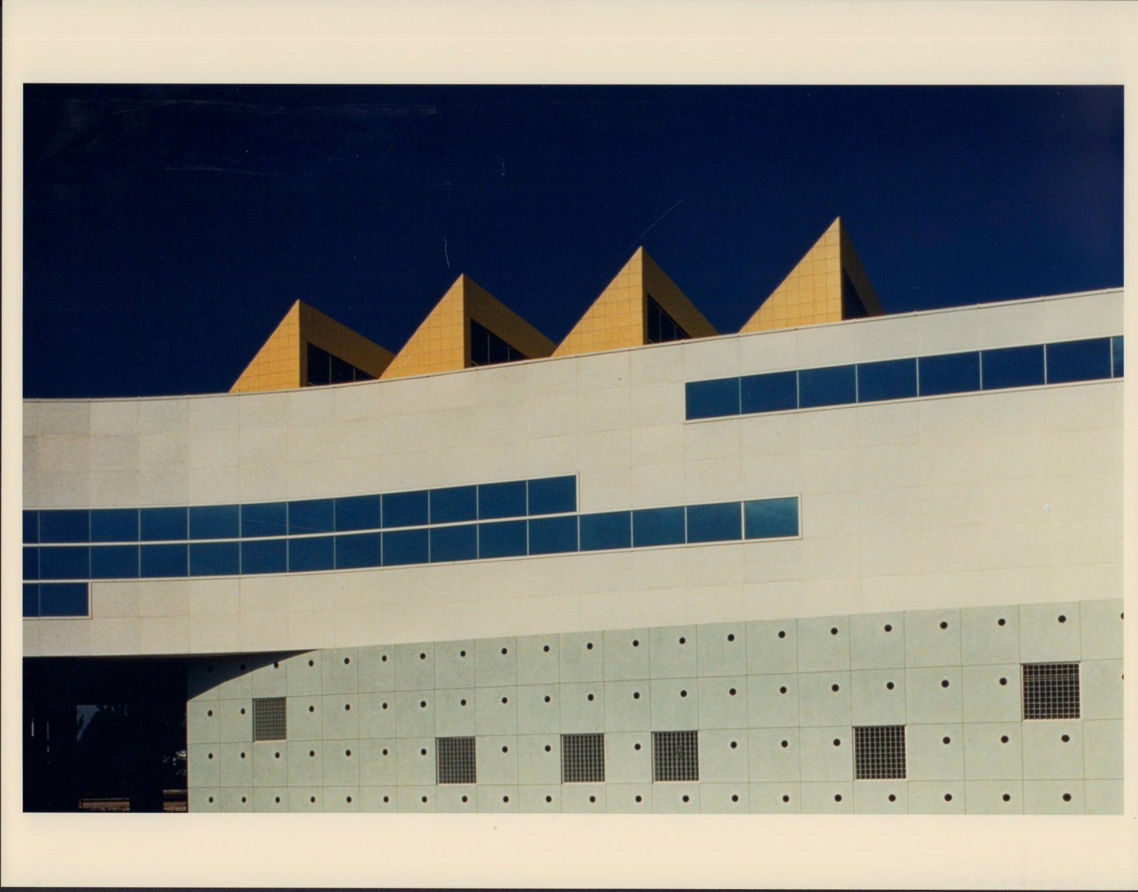 Pat Fisher, Color Photograph, North Dade Justice Center, Miami, 1988: Photographer Pat Fisher photographed the Facade Detail of the Miami, Florida North Dade Justice Center in 1988. The architectural building was designed by architect firm Arquitectonica in 1987. This p