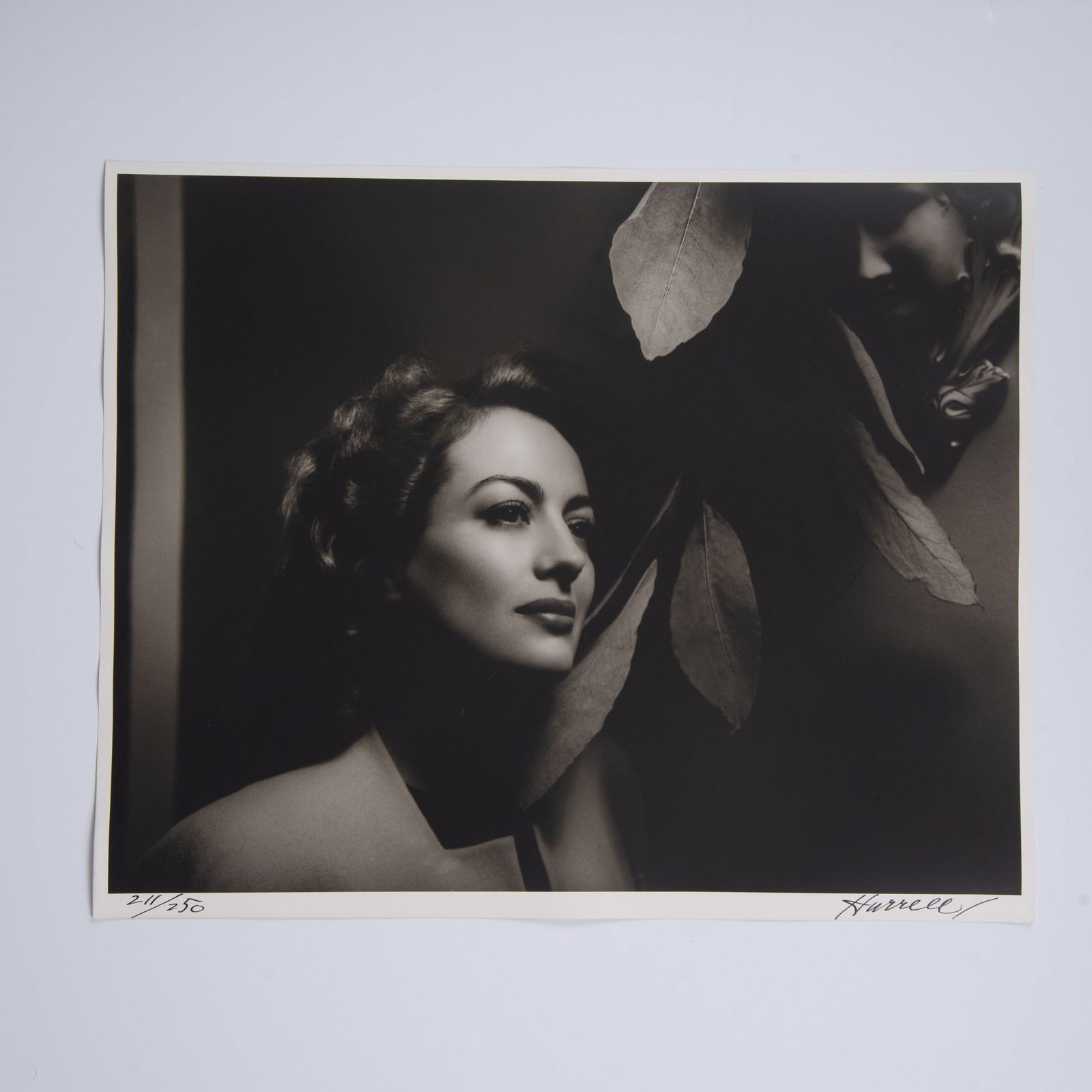 George Hurrell, Original Silver Gelatin Photograph of Joan Crawford, Signed: An exquisite original gelatin silver print on Portriga fiber paper by legendary photographer George Hurrell, featuring Hollywood icon Joan Crawford. This photograph, taken in circa 1930s at Joan Crawf