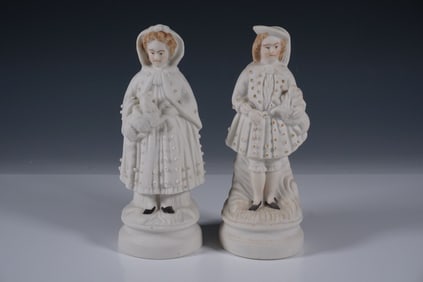 Pair of Bisque Porcelain Boy and Girl Figurines