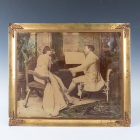 Vintage Photograph of a Man and Woman in Front of a Piano
