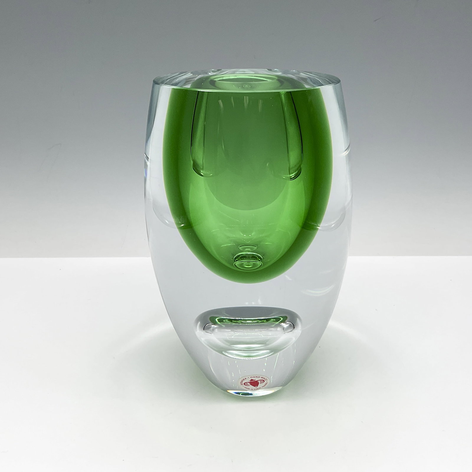 Beranek Handblown Art Glass Bud Vase, Signed: Striking artistic handmade clear ovoid glass with green accent bubble. Signed by Artist. Beranek Glass Czech Republic label. Artist: Jeronim Tisjlar Issued: 20th century Dimensions: 6.75"H x 4" dia. C