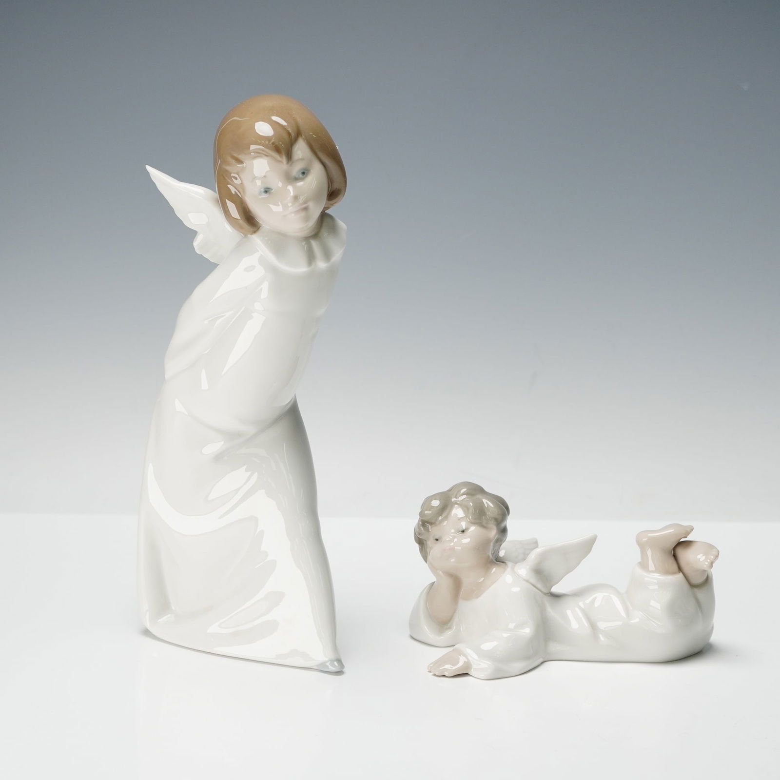 2pc Lladro Porcelain Figurines, Cherub Smiling 4960 & Angel Reclining 4541 (1 of 3)