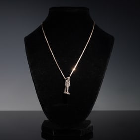 Metal Figure Pendant on Sterling Silver Necklace