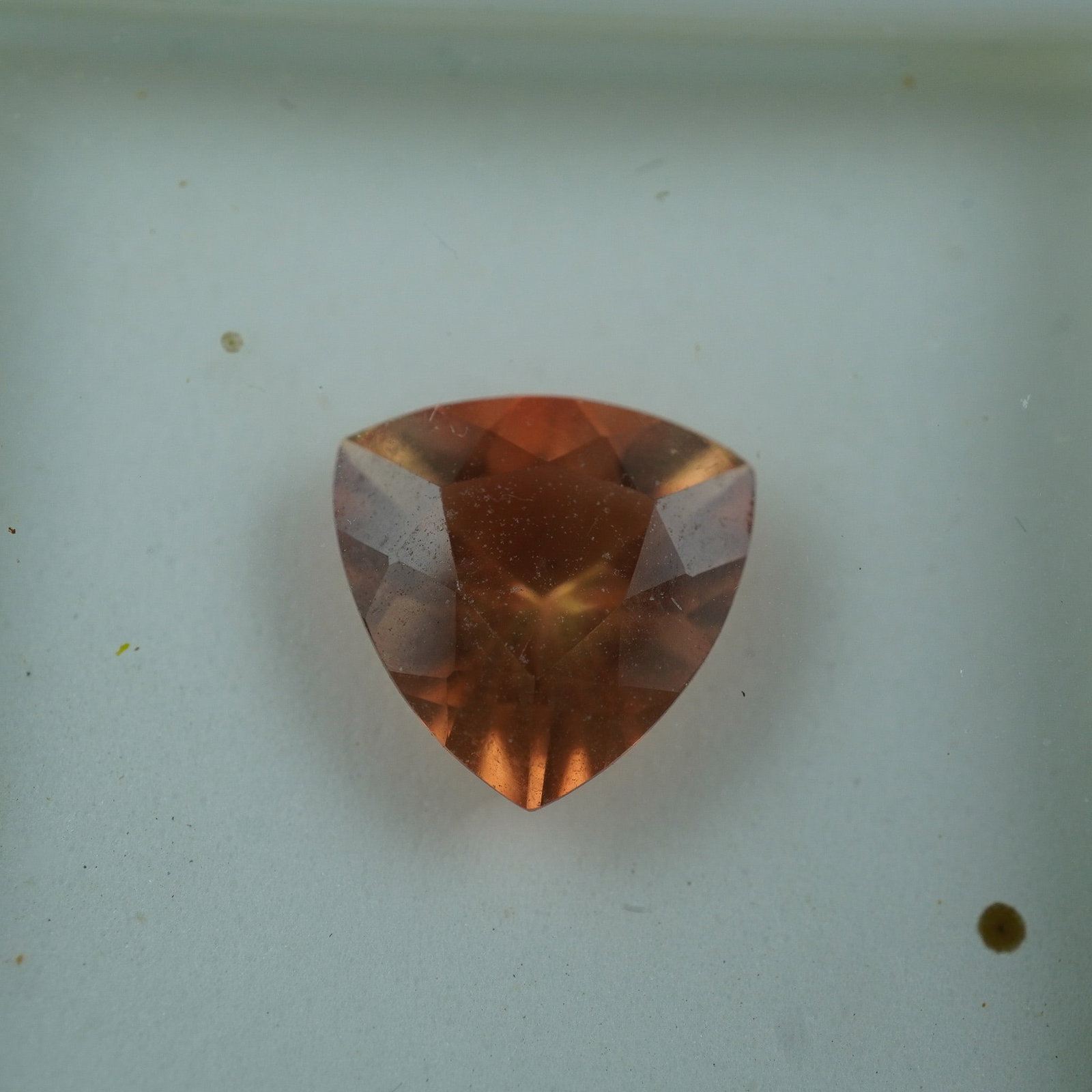 2.41 CT Honey Labradorite Trillion Cut Gemstone: This stunning honey labradorite gemstone features a trillion cut and weighs approximately 2.41 carats. The warm honey tones of this gemstone are complemented by its unique iridescent sheen, a signatur
