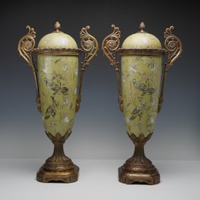 Pair of Ornate Porcelain and Gilt Metal Covered Decorative Urns