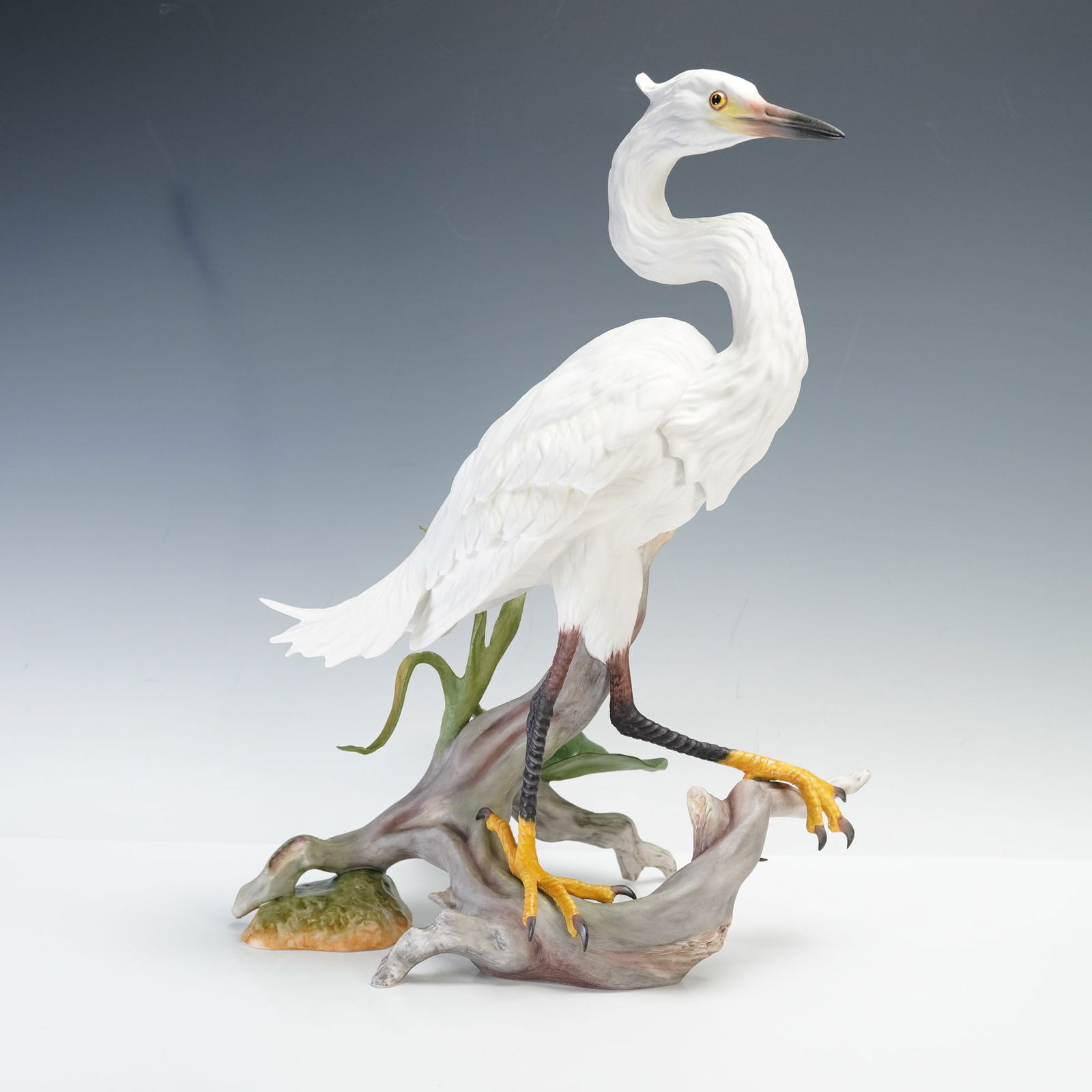 Boehm Porcelain Sculpture, Snowy Egret 40420: An exclusive numbered edition, this is no. 105. Edward Marshall Boehm Studio sculpture depicting a Snowy Egret bird and produced as "The official National Audubon Society 1993 Porcelain Sculpture." Th