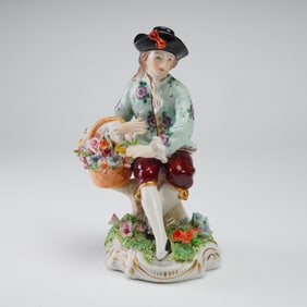 Sitzendorf Seated Flower Seller Porcelain Figurine