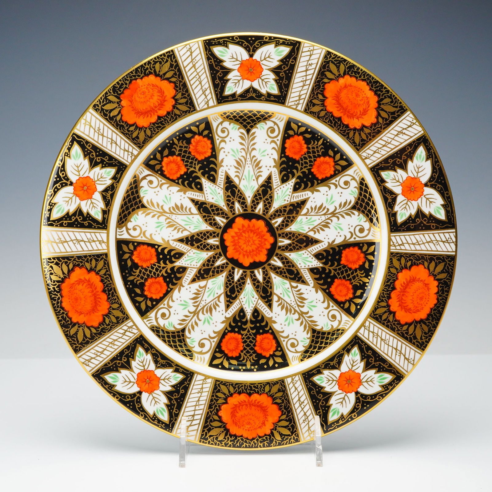 Abbeydale Bone China Dinner Plate, Canton: A bone china dinner plate in the Abbeydale Canton pattern, decorated with an intricate arrangement of orange floral motifs, black panels, and gold foliate detailing. The design features a central flow