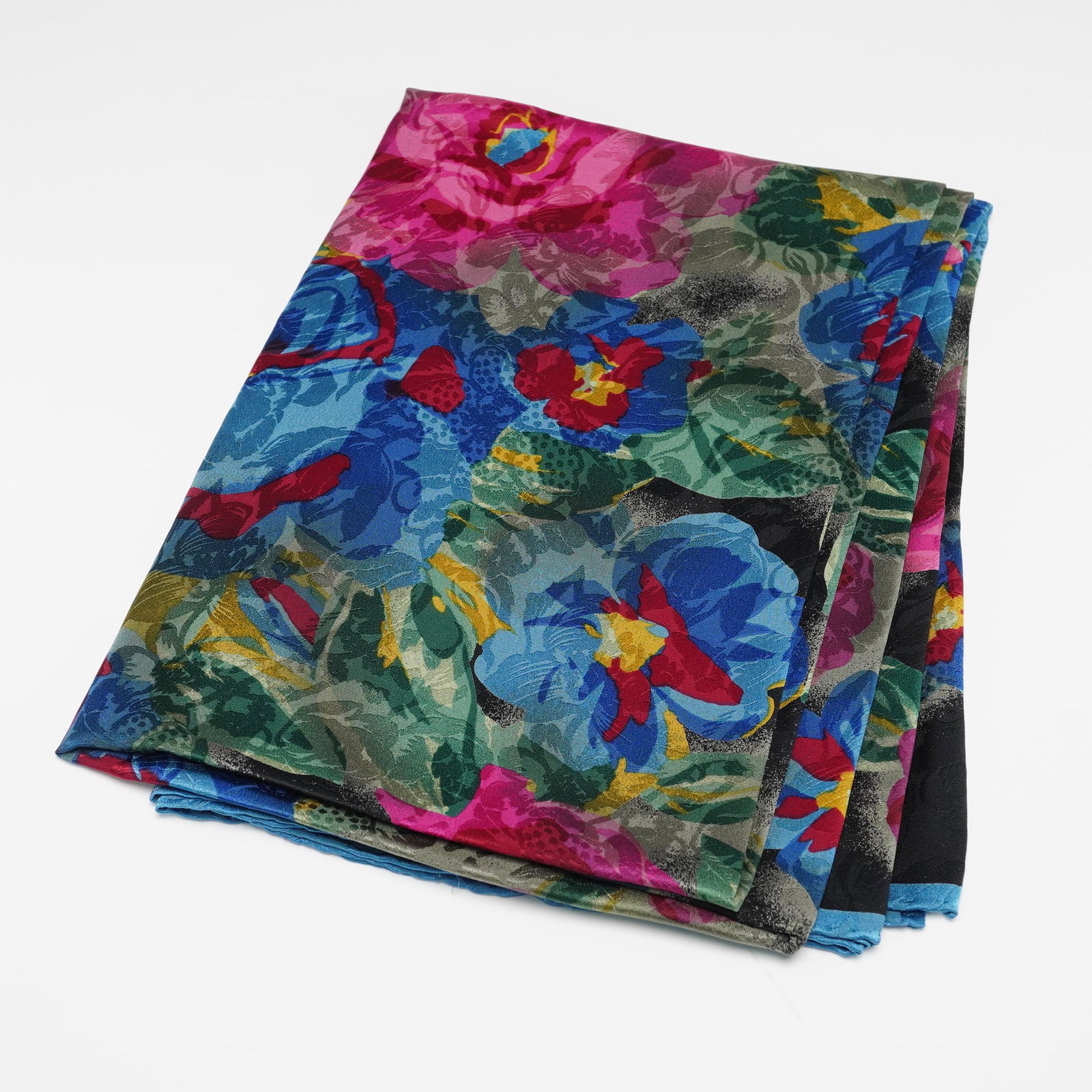 Emanuel Ungaro Floral Silk Jacquard Scarf: Square silk jacquard scarf featuring an abstract floral pattern in shades of blue, pink, red, and green with a contrasting aqua blue border. Includes Emanuel Ungaro Made in Italy label. Dimensions: ap