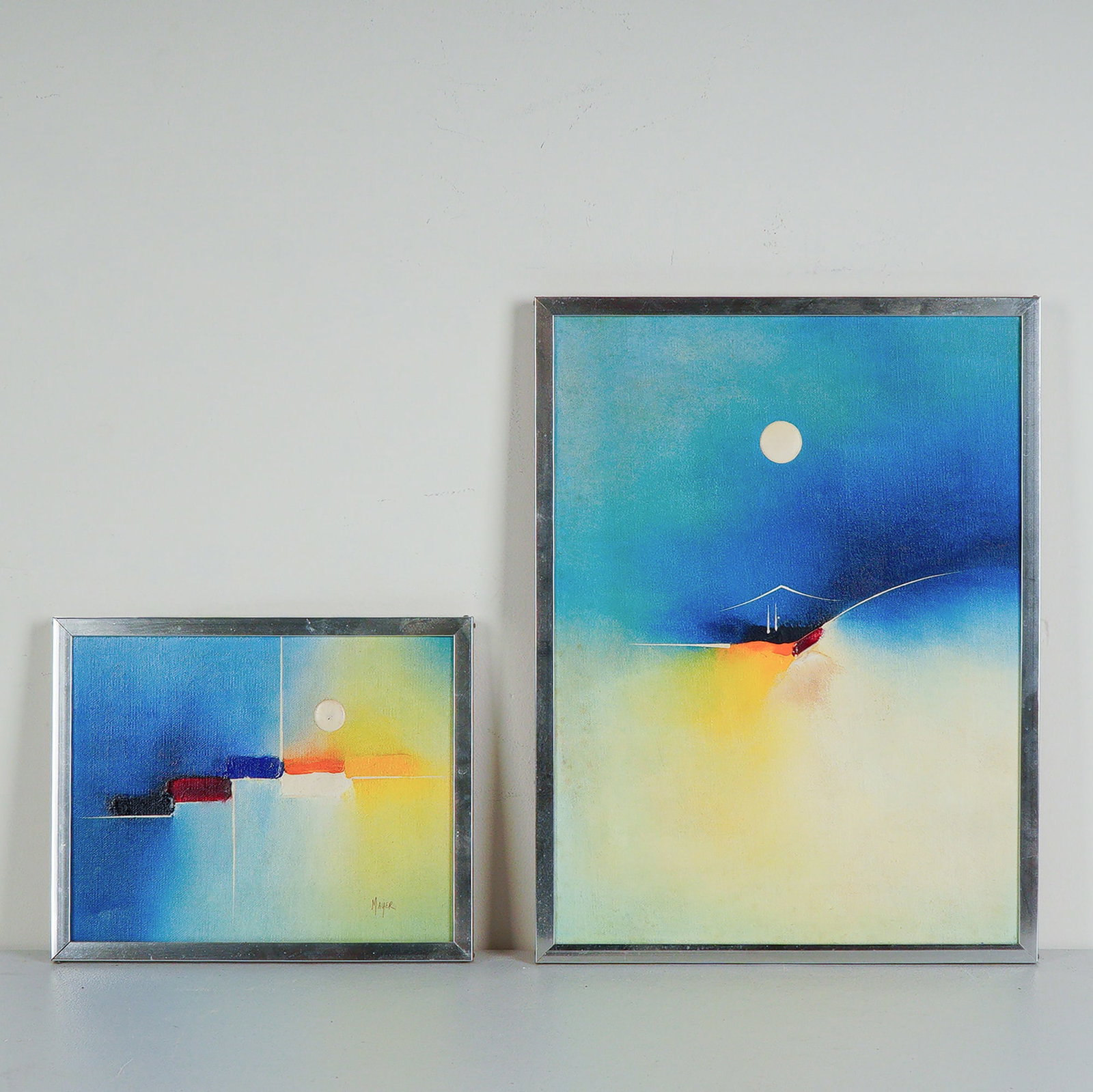 Pair of Acrylic on Canvas Paintings, Atmospheric Abstractions, Signed Mayer: A pair of minimalist acrylic on canvas artworks by Mayer, both framed and showcasing the artist's signature use of bold color fields, ethereal gradients, and dramatic contrasts. The larger canvas draw
