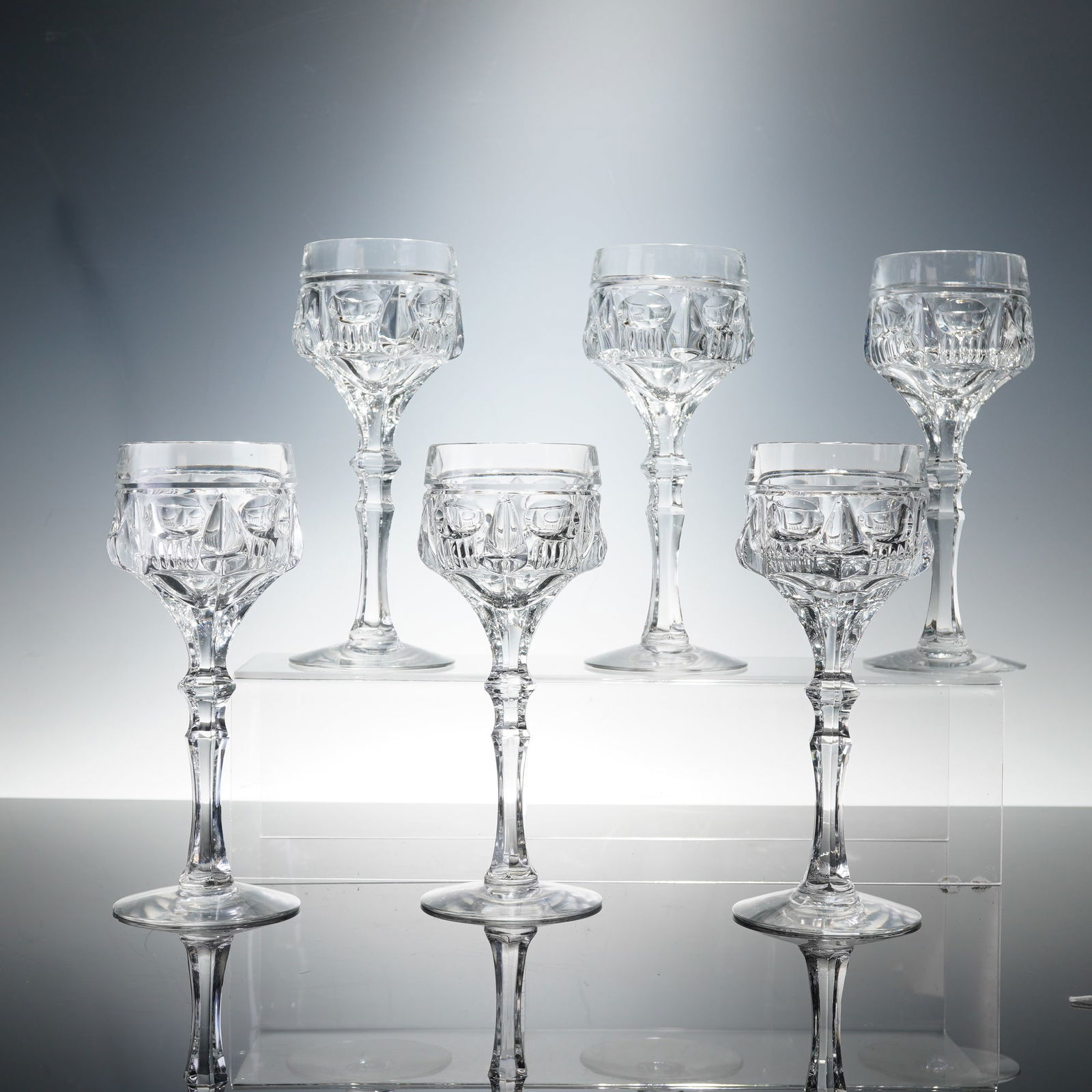6pc Clear Cut Crystal Wine Glasses: A refined and beautifully balanced set of six hand-cut crystal wine glasses, each meticulously crafted with faceted geometric decoration and a crisp optical brilliance. The bowls feature deep panel an
