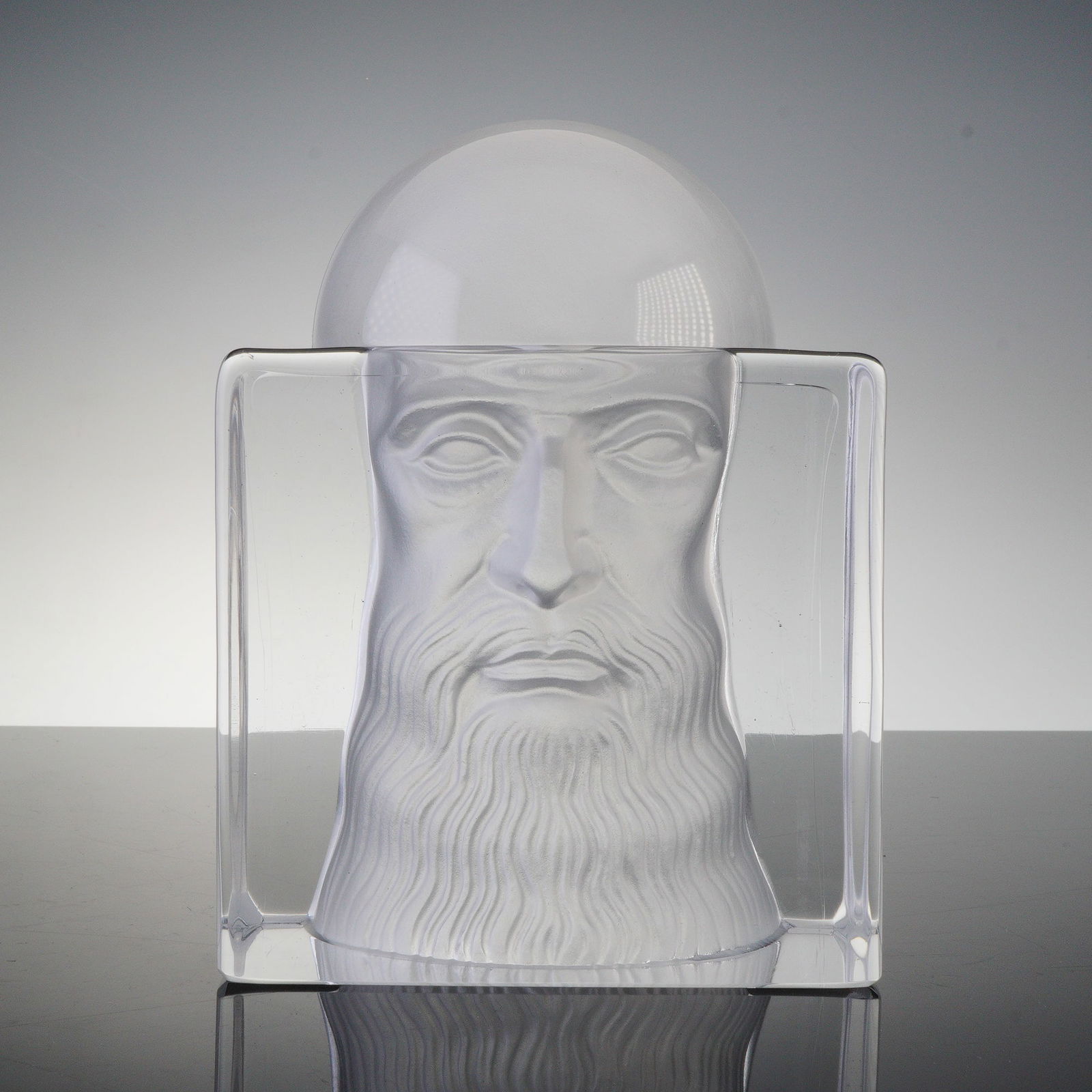 Daum Crystal Leonardo da Vinci Sculpture by Josep Subirachs: Limited edition crystal sculpture depicting the face of Leonardo da Vinci, designed and signed by renowned Catalan sculptor Josep Subirachs. Executed in heavy, high-clarity Daum crystal, the piece fea