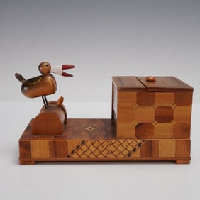 A Mid-20th Century Wooden Mechanical Bird Cigarette Dispenser with