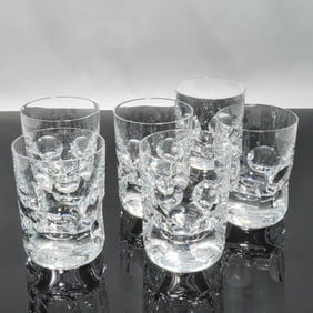 A Set of Six Baccarat Sculpted Crystal Tumblers
