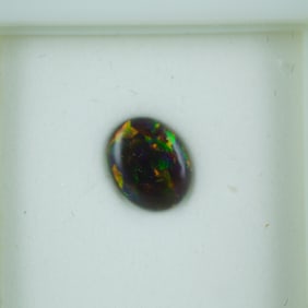 1.25 CT Gilson Black Opal Oval Cut Gemstone