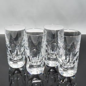 A Set of Four Baccarat Pluton Crystal High Ball Tumblers