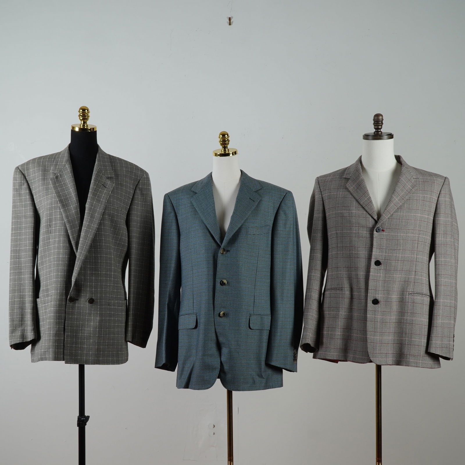 3pc Men's Jackets, Versace, Ermenegildo Zegna, and Rufus: Collection of three men's blazers in patterned wool fabrics. Includes an Istante by Versace black and white check double-breasted jacket with a gray lining; a Ermenegildo Zegna teal single-breasted ja