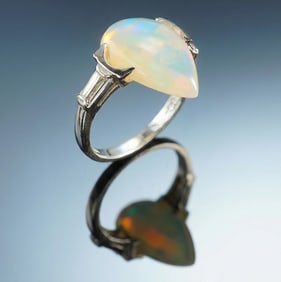 Platinum 4.77ct Pear-Shaped Opal and .20ctw Baguette Diamonds Ring