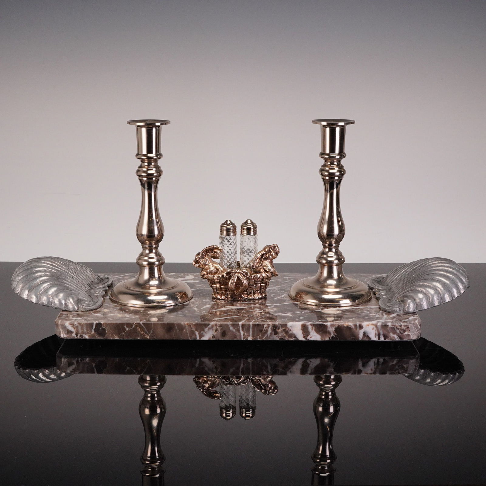 6 Gallery Originals Candlesticks, Mini Salt/Pepper Basket & Marble Tray: This is a collection of six items forming a mixed-media table centerpiece set. The collection includes a pair of silver-toned metal candle holders of a traditional columnar design, a rectangular polis