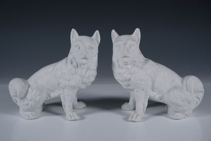 Pair of Bisque Porcelain Dog Figurines