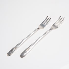 A Pair of H. & T. MFG. CO. Meadow Flower Silverplate Salad Forks