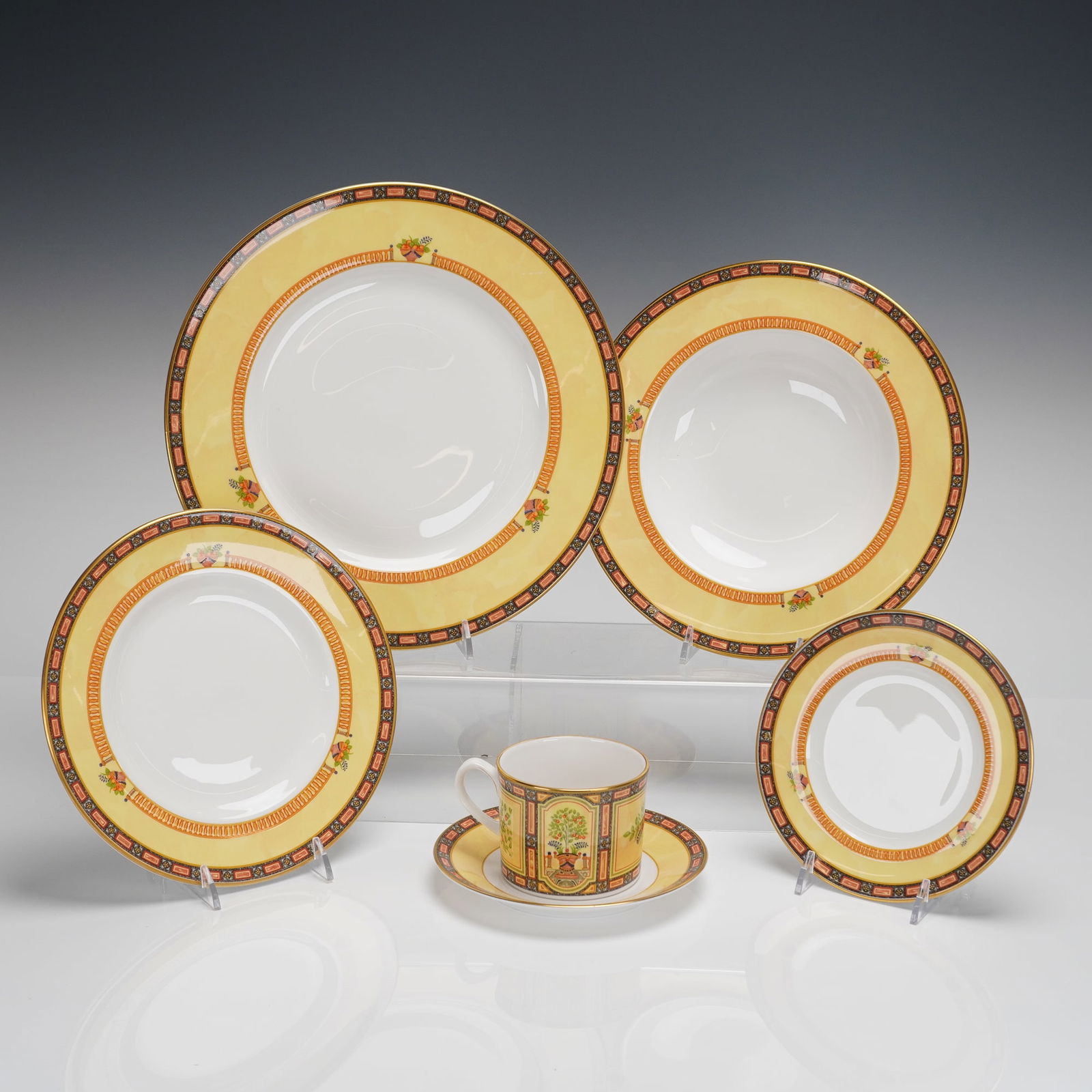 Coll. of 6 Royal Worcester Versailles Fine Bone China Dinnerware Pieces: A 6-piece collection of Royal Worcester bone China dinnerware in the Versailles pattern. This set of fine bone china includes one dinner plate, one large rimmed soup or pasta bowl, two smaller plates