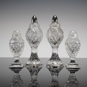 A Collection of 4 Crystal Salt and Pepper Shakers (2 Pairs)