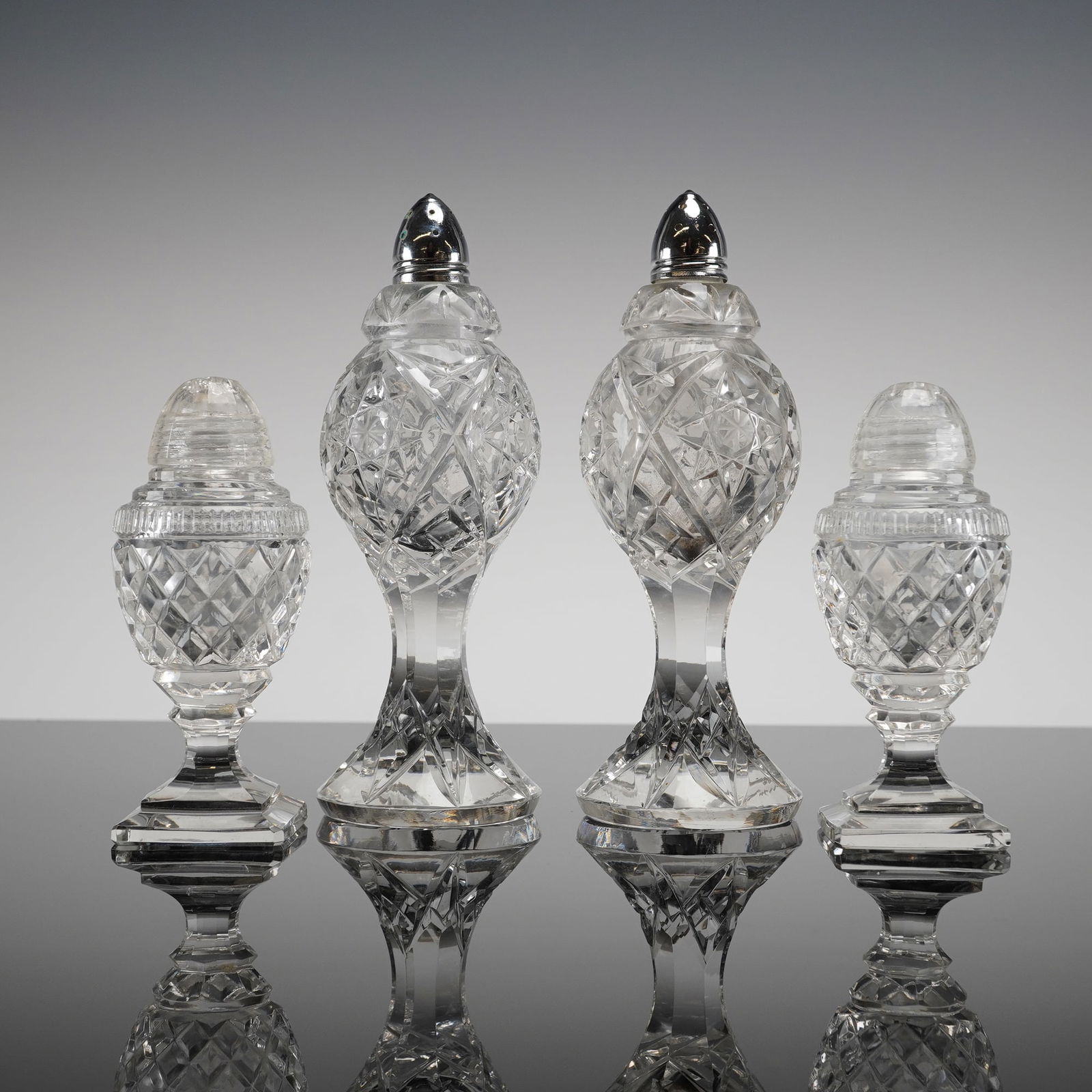 A Collection of 4 Crystal Salt and Pepper Shakers (2 Pairs) (1 of 3)