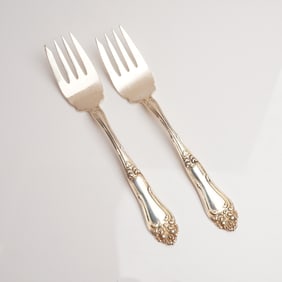 A Pair of Amston Sterling Silver Rococo Revival Personal Salad Forks