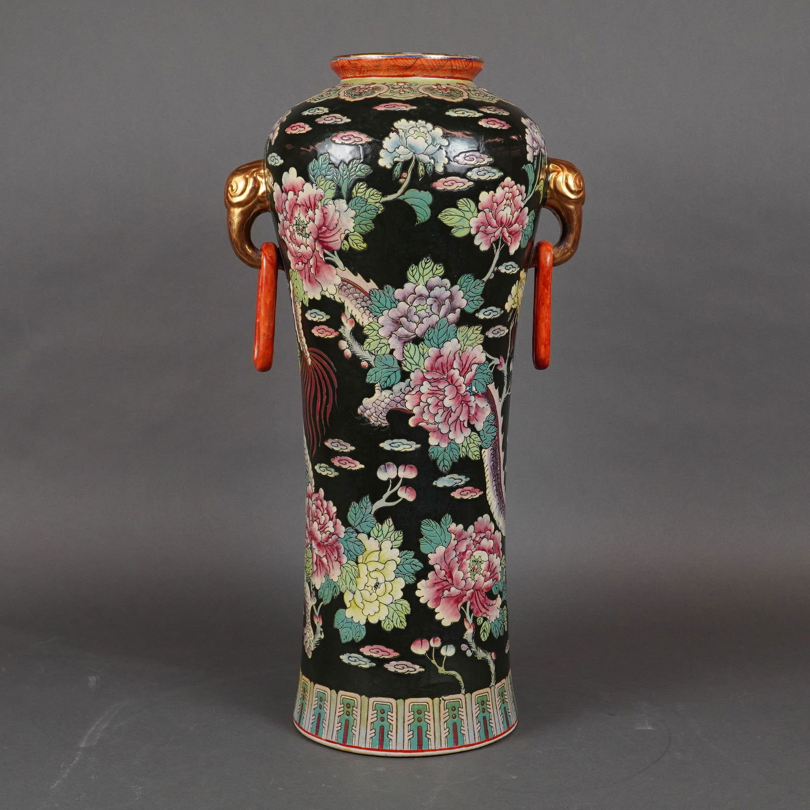 A Large Chinese Famille Noire Porcelain Club Vase, Qianlong Mark: A large Chinese porcelain club vase (rouleau or cylindrical form) executed in the polychrome famille noire palette. The vase features dense, multi-colored overglaze enamel decoration on a glossy black