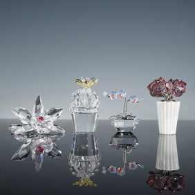 A Collection of Four Swarovski Crystal Botanical Figurines