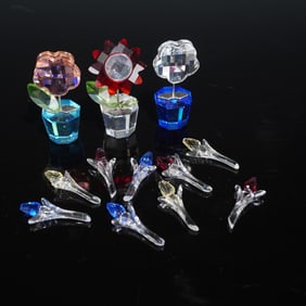 A Collection of 12 Swarovski Crystal Flower Figurines and Components