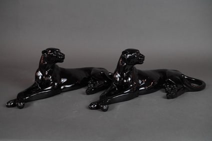A Pair of Art Deco Style Black Glaze Panther Figurines