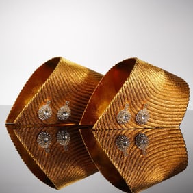 A Pair of Gold-Tone Sculptural Cuffs