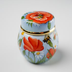 An Elliot Hall Enamels Enameled Pill Jar, Poppies and Daisies