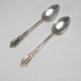 A Pair of Wallace Sterling Silver Rose Point Pattern Spoons