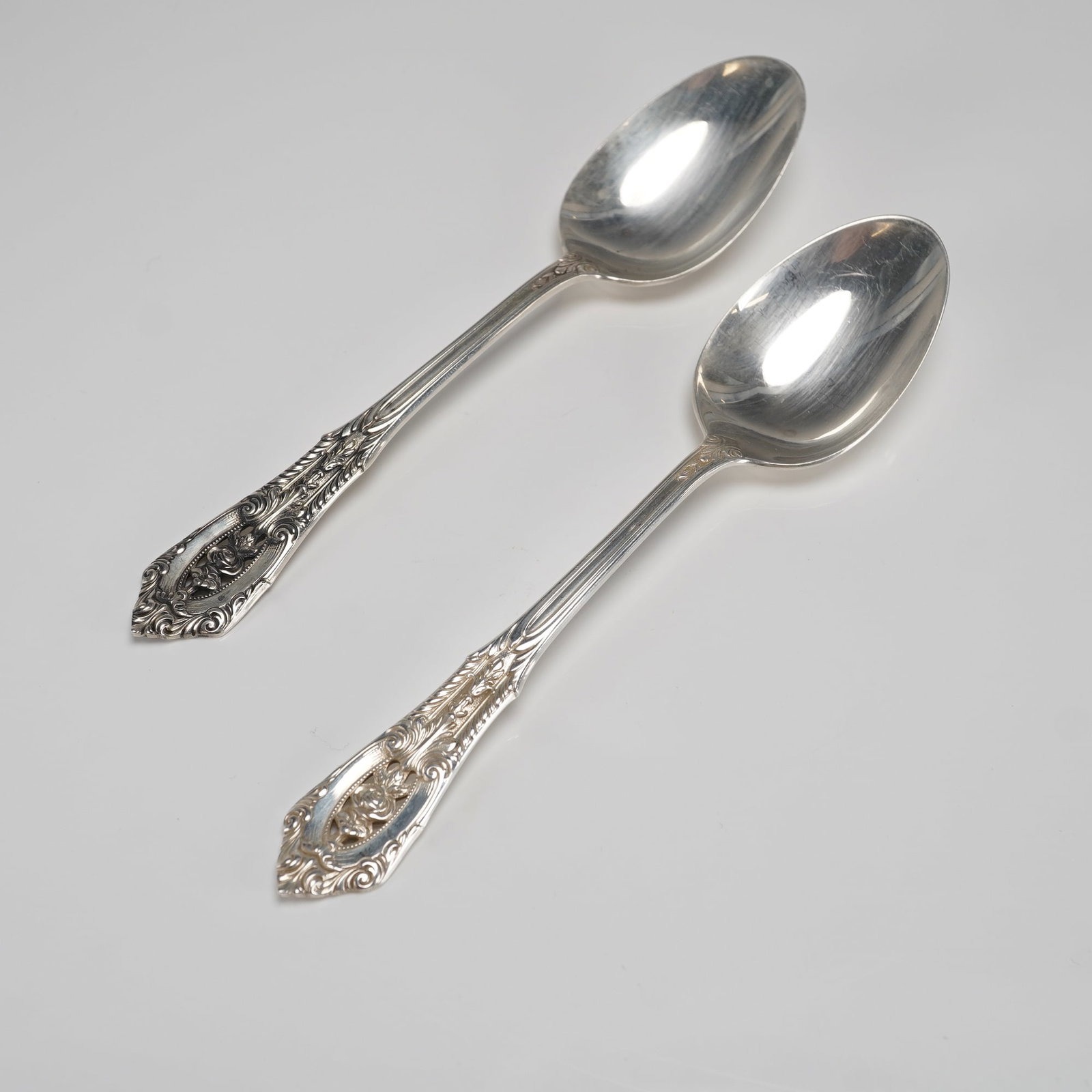 A Pair of Wallace Sterling Silver Rose Point Pattern Spoons (1 of 5)