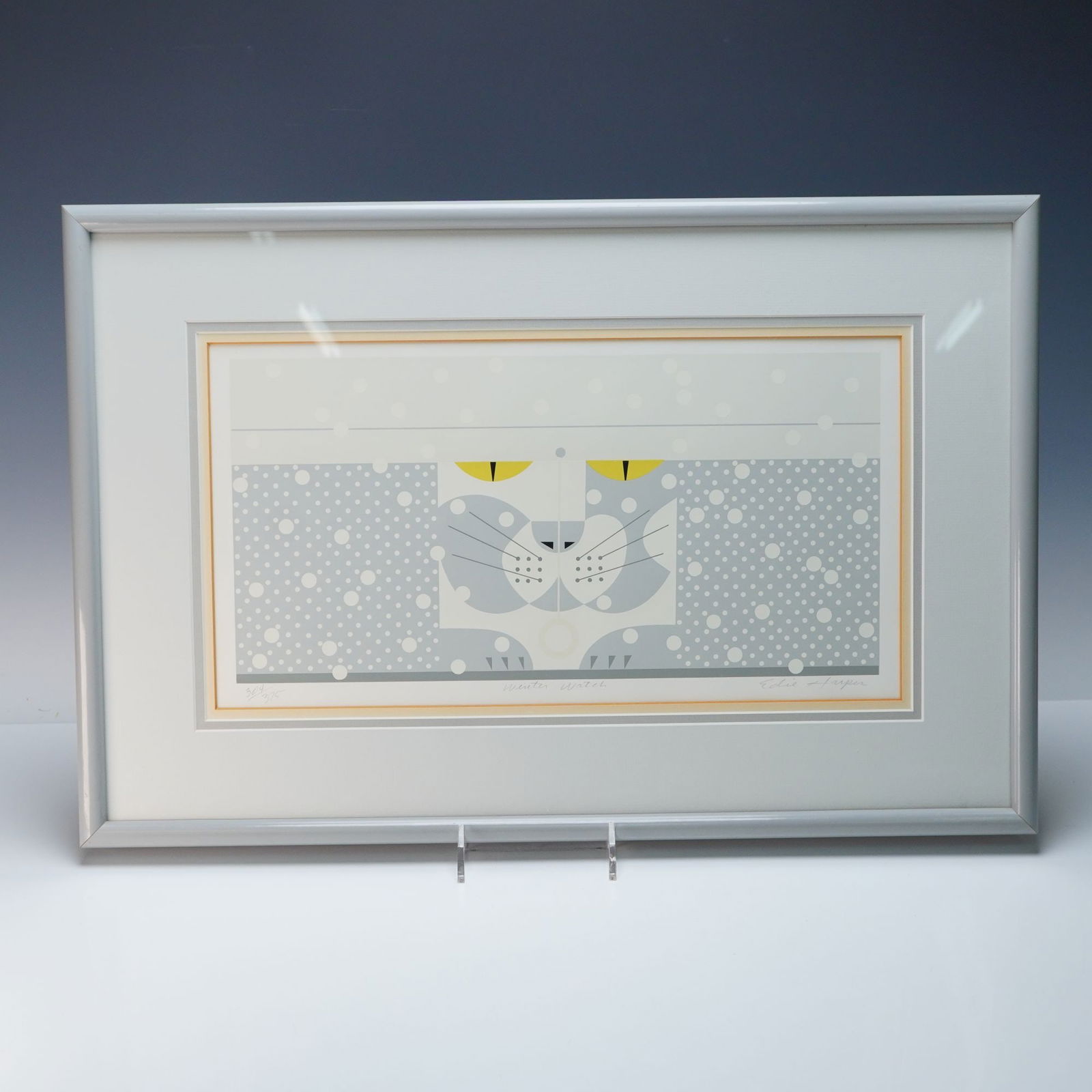 Edie Harper 'Winter Watch' Signed Serigraph: Edie Harper (American, 1922-2010) 'Winter Watch' serigraph. A contemporary print featuring a highly stylized, geometric depiction of a cat's face with bright yellow eyes, a segmented grey body, and a