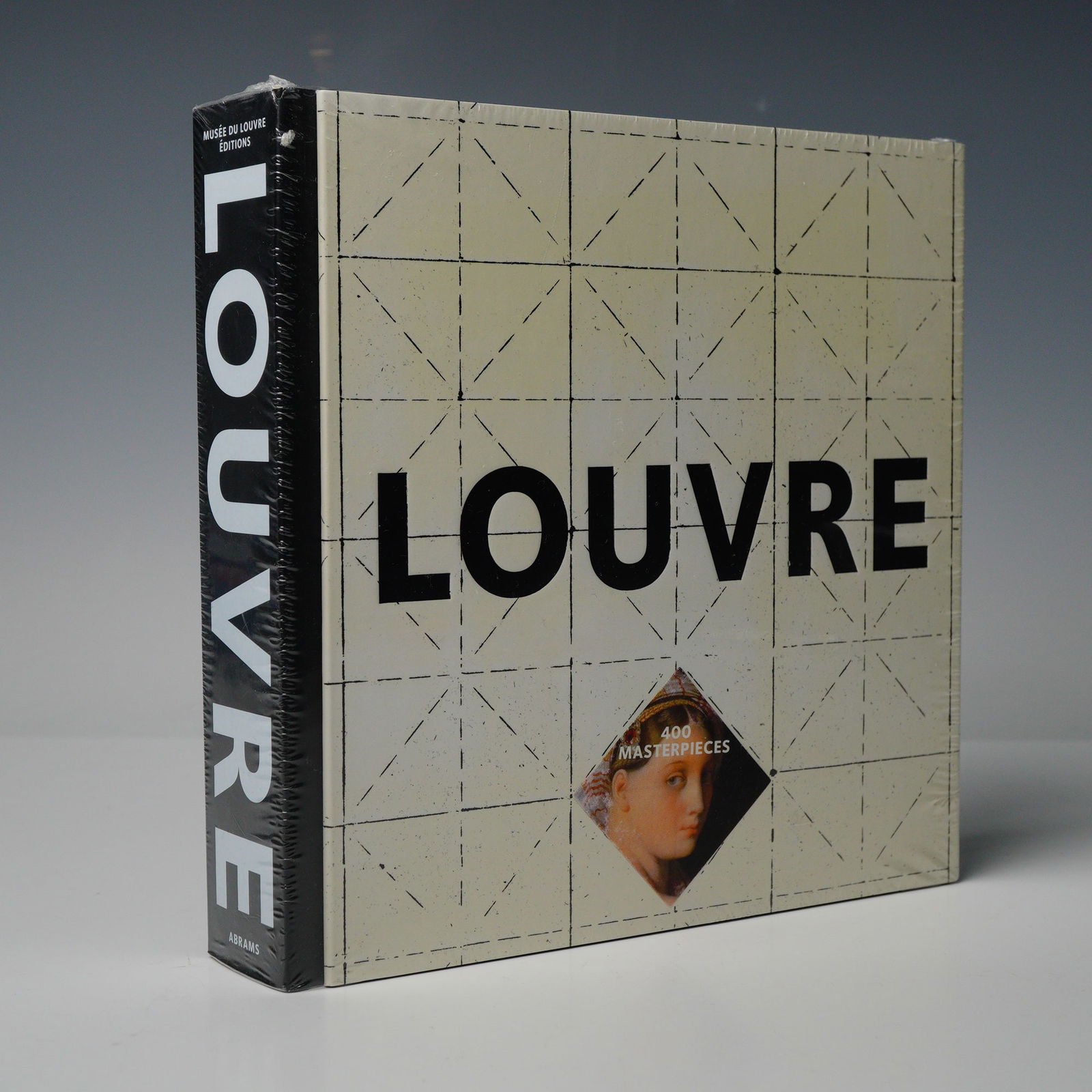 Soulie, Daniel. Louvre: 400 Masterpieces. Abrams, 2017.: Daniel Soulie. Louvre: 400 Masterpieces. New York: Abrams, 2017. Modern trade edition. Quarto format. Publisher's black hardcover boards with pictorial cover and integrated spine design, featuring the