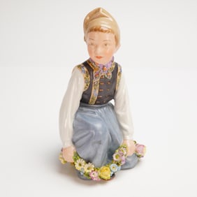 Royal Copenhagen Amaget Boy Fig. No. 12414 designed by Carl Martin-Hansen