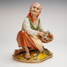 Hoffner & Co. Porcelain Figurine of a Kneeling Fishmonger Woman